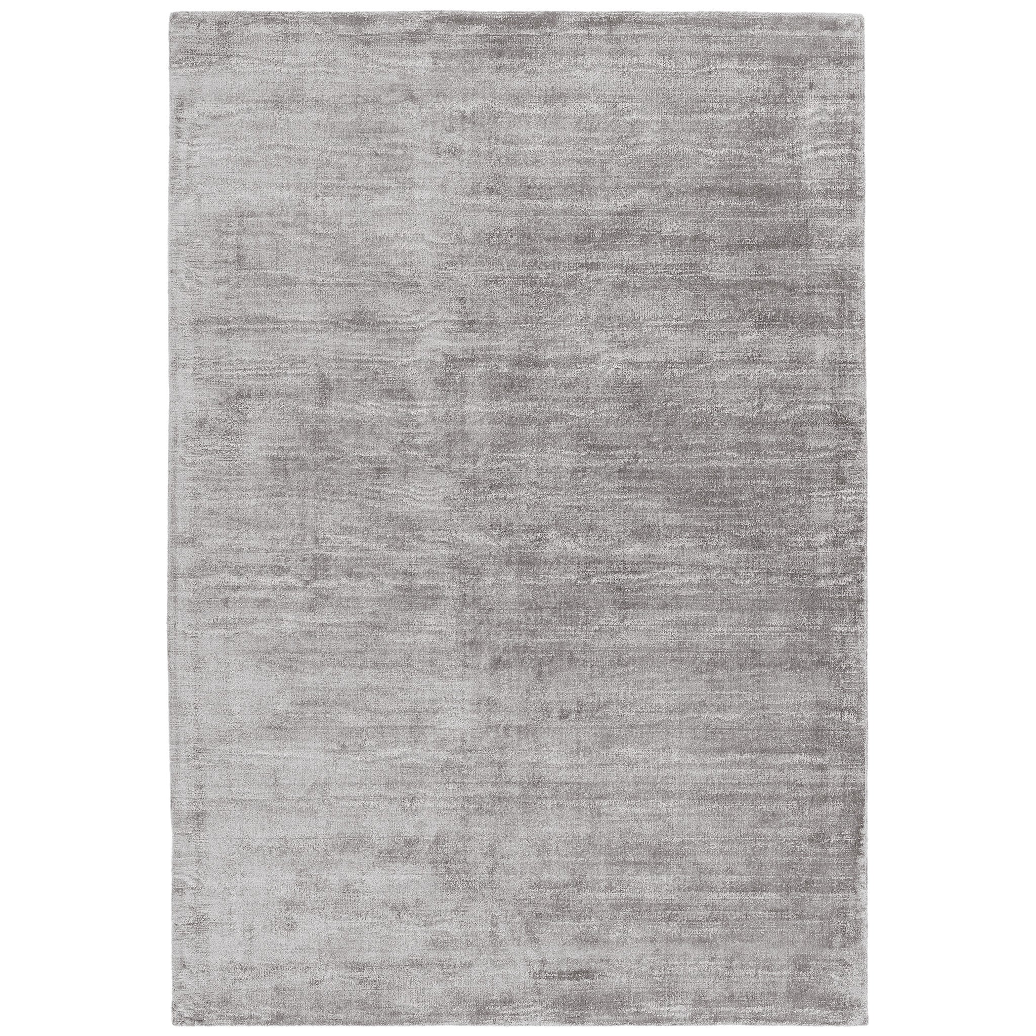 Luxury handwoven viscose rug, in silver colour, with a tip sheared finish giving a vintage effect. Size - Extra Large Pile Height: 7mm Dimensions: 2400 x 3400 mm 100% Viscose Hand Woven in India Delivery: 5-7 days